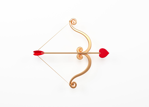 Bow and arrow for valentines day gold bow with red heart shaped tip on white color background