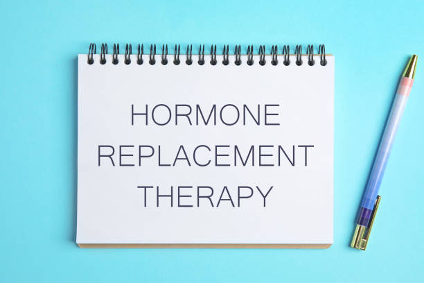 istock Notebook with text Hormone Replacement Therapy and pen on turquoise background, flat lay 1448792557