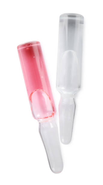 istock Glass ampoules with pharmaceutical products on white background, top view 1448793388