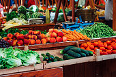 Fresh vegetables and fruits for sale on market stall