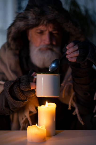 istock Senior man freezing at home 1448799844