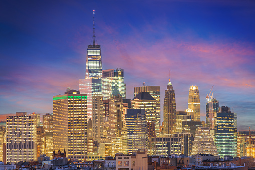 New York, New York cityscape in Lower Manhattan at twilight.