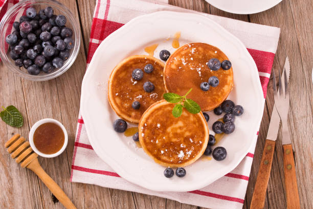 istock Pancakes with blueberries and chocolate cream. 1448803790