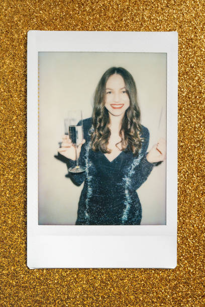 Instant photo of a happy woman from a New Year's Eve Party stock photo
