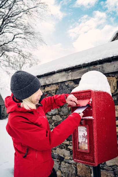 istock Posting Christmas cards from a village 1448804782