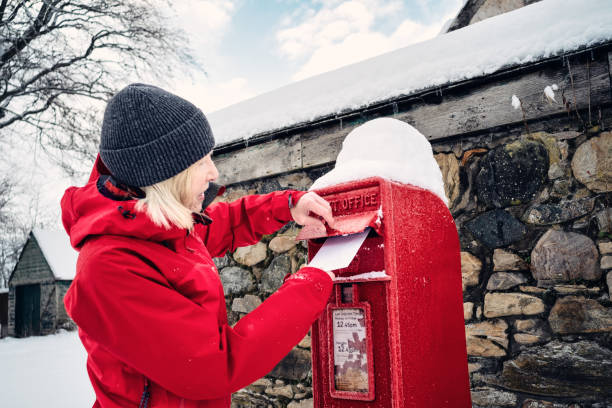 istock Posting Christmas cards from a village 1448805449