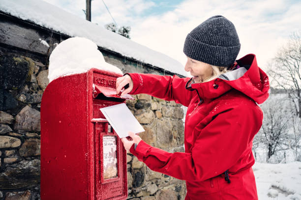Posting Christmas cards from a village