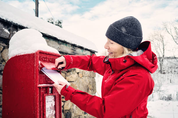 istock Posting Christmas cards from a village 1448805653