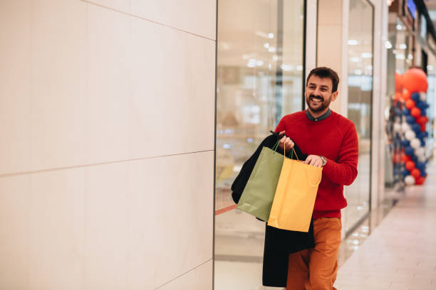 istock Young man on a mission - Christmas shopping! 1448807850