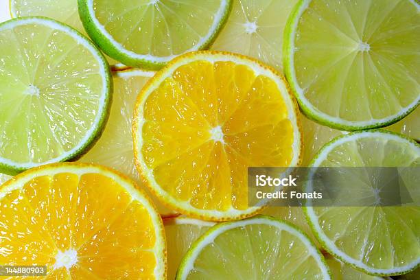 Lima Fatias De Limão E Laranja - Fotografias de stock e mais imagens de Alimentação Saudável - Alimentação Saudável, Casca de fruta, Citrino