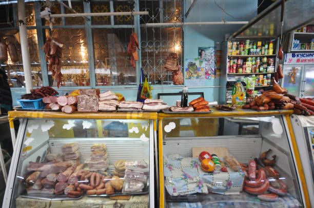 Almaty bazaar market stall with meat, saucages and more. The image was captured during summer season.