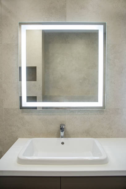 istock Bathroom interior with mirror and wash basin. 1448813269