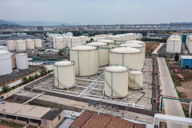 istock Oil storage tanks under cloudy sky 1448817339