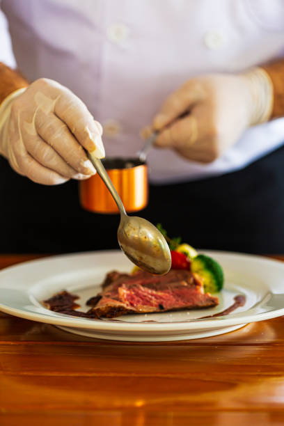 istock Beef steak and human hands,Be sure to have them ready in the restaurant. 1448823491