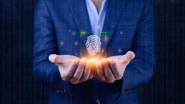 istock Businessman using showing scanning fingerprint, Biometric identity and authorization futuristic concept of password security and control through fingerprint in future. 1448825614