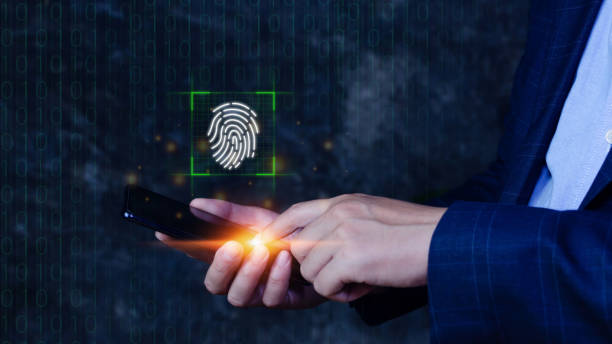 istock Businessman using touching Smart Phone with scanning fingerprint, Biometric identity and authorization futuristic concept of password security and control through fingerprint in future. 1448825618