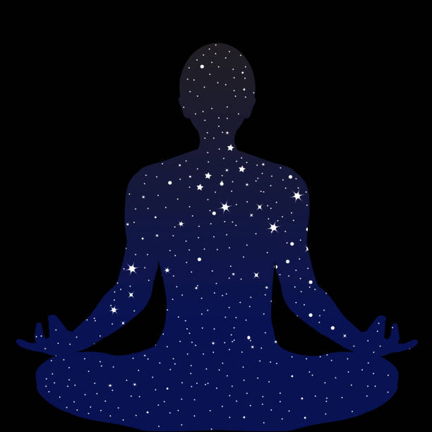 istock Man sits in a lotus position and meditates with pattern made of night sky with stars 1448825919