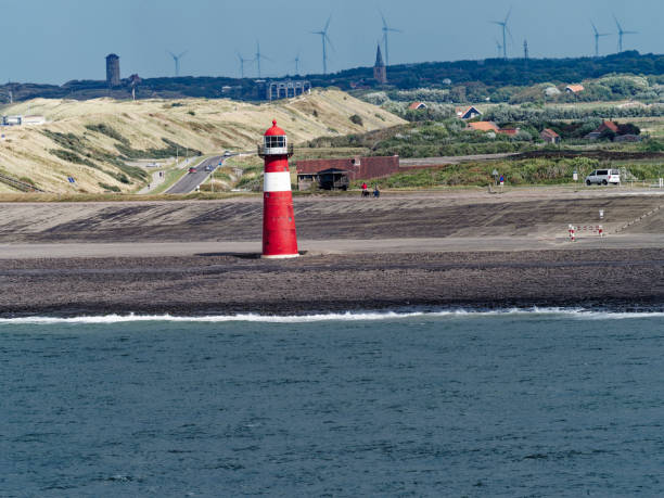 istock beach in north europe  with light house 1448835659