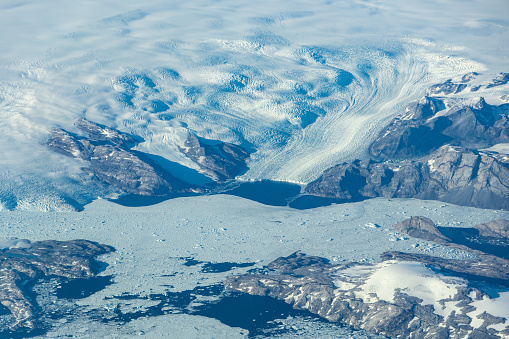 Aerial view of Glaciers meeting the ocean in Greenland