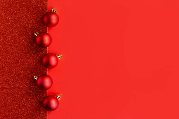 istock Beautiful Christmas ornaments on a bright red background. 1448843783