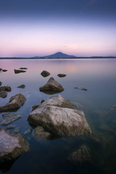 istock Lake landscape with a mountain in the background 1448846302