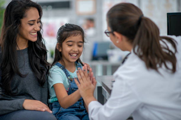 istock At the Doctor with Mom 1448846645