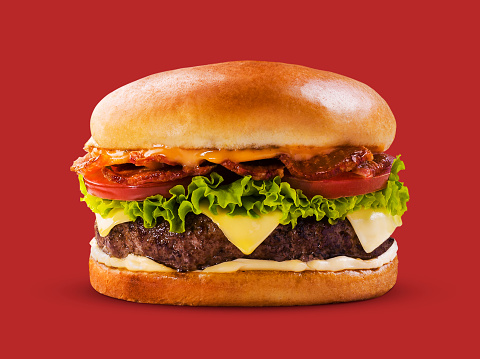 Burger isolated on red background