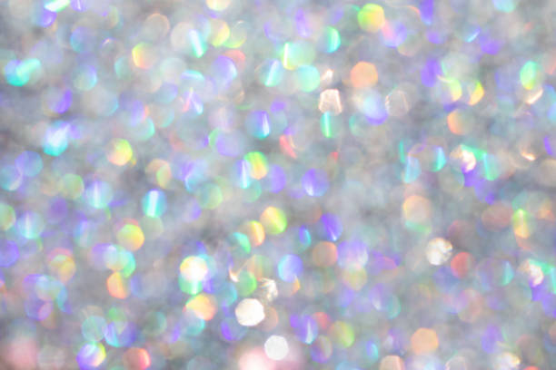 istock Abstract defocused holographic background with shining glitter.Good as overlay layer. 1448859149