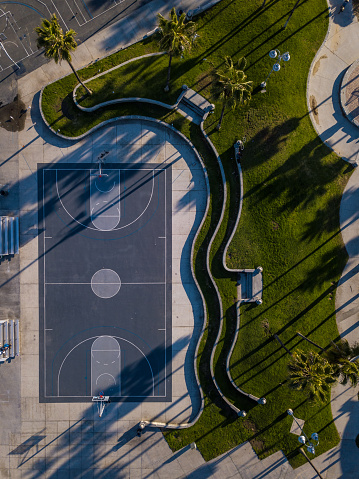 Aerial photography of the venice beach boardwalk, shops, vendors, venice skate park, roller skating area, graffiti walls, beach, and other public areas. Photos taken with a drone during the December in Los Angeles.