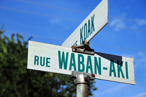 Odanak reservation, Nicolet, Quebec, Canada: Abenaki language street names at an instersection - Odanak is an Abenaki First Nations reserve, Abenaki is an endangered Algonquian language