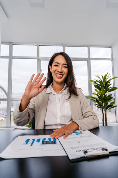 istock Young Asian Businesswoman Having A Video Call With A Client 1448868355