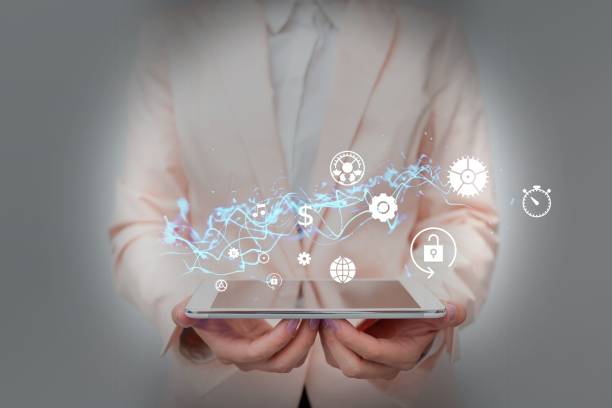 istock Lady In Suit Holding Phone And Performing Futuristic Image Presentation. 1448873287