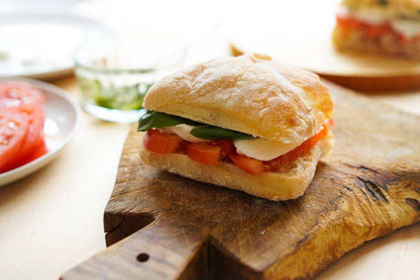 italian panini sandwich panino caprese - caprese salad fotos imagens e fotografias de stock