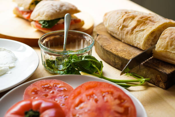 Vegetarian Sandwich with tomatoes, mozzarella and basil.