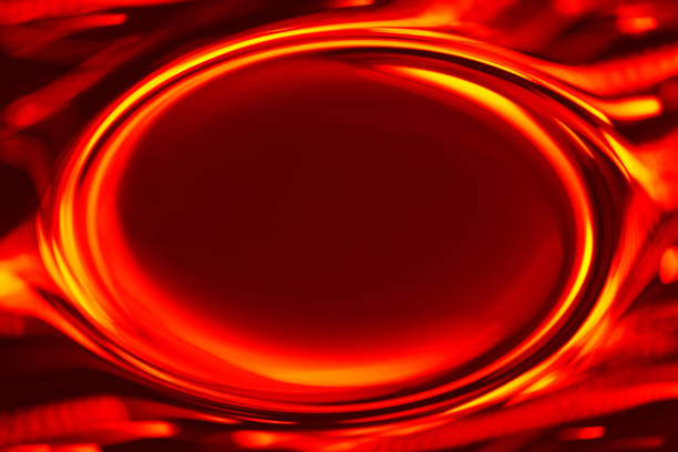 A closeup shot of a glowing lamp in the dark with a blurred background