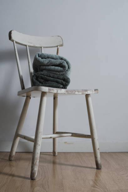 istock green shades folded over the chair 1448880868