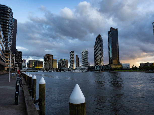 istock Urban skyline from river at sunset 1448882272