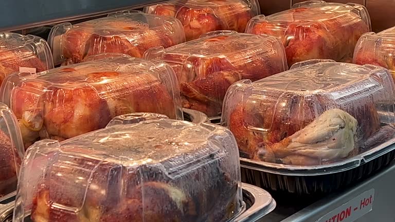 Packed roast chickens placed on the shelf