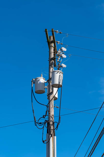 istock Electrical lines at the top of a telephone pole 1448893985