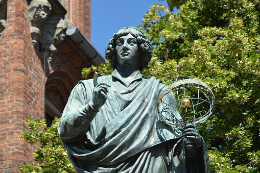 Memorial for the astronomer Nicolaus Copernicus on the market place Rynek Staromiejski in Torun - Poland.