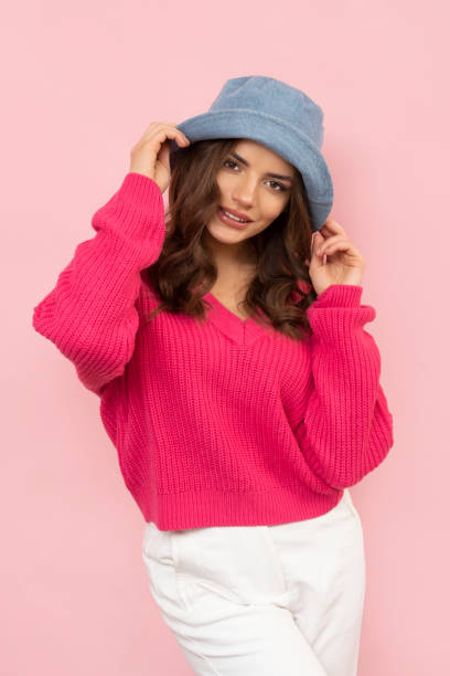 istock Stylish smiling  brunette in blue hat and sweater. 1448906707