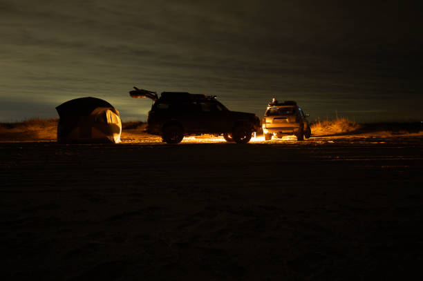 istock Overland campsite at night on beach 1448908960