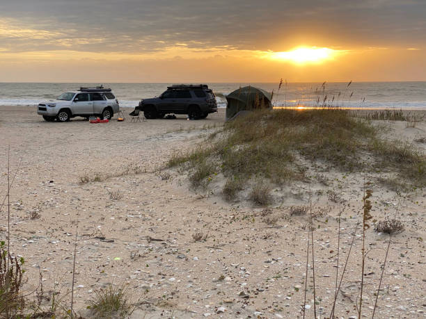 istock Sunrise at overlanding beach campsite 1448908970