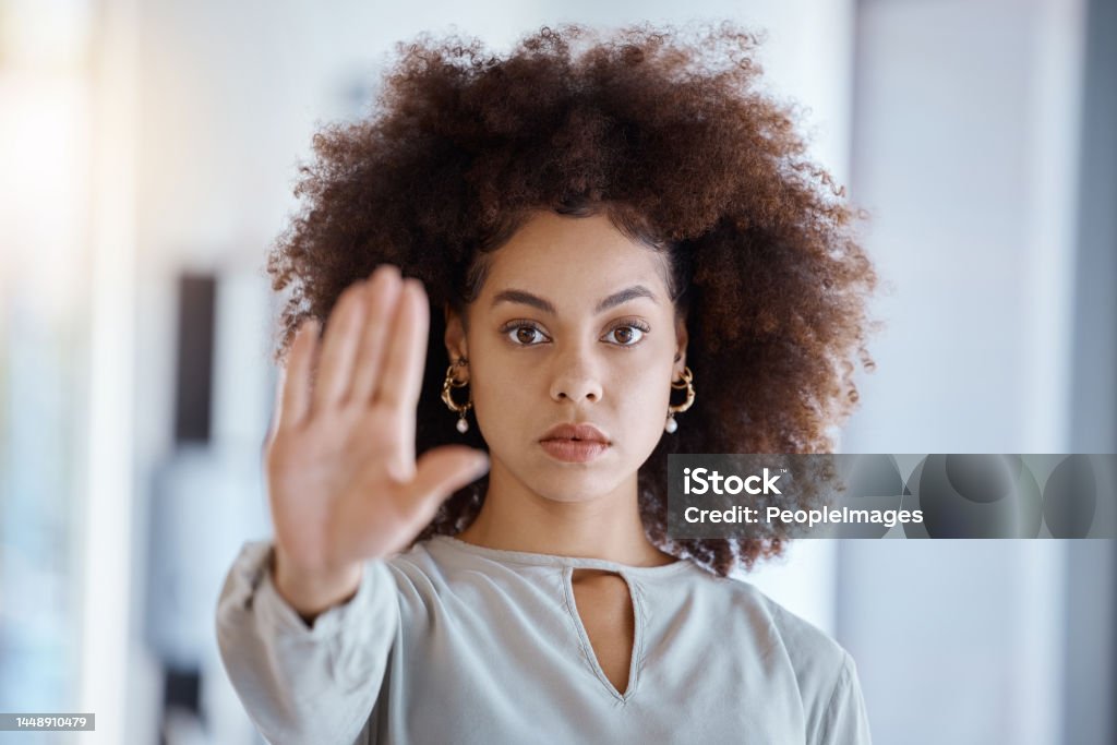 Hands, hr and manager stop sign with hand in office, serious, power and change in corporate. Black woman fighting sexual harassment, discrimination and toxic work environment with employee protection Harassment Stock Photo