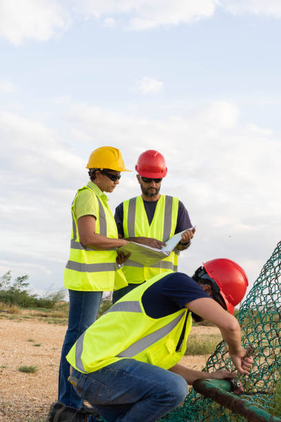 istock Industrial engineers working in an industrial park 1448923168