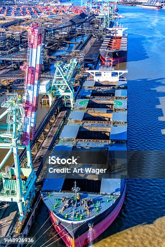 istock Coal Ship Being Loaded in Port 1448926936