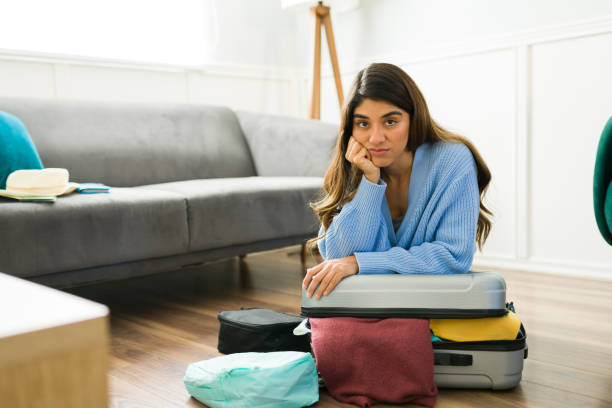 istock Angry latin woman with problems packing 1448932672