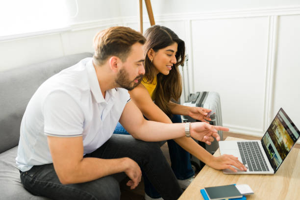 istock Profile of a couple looking for vacation trips online 1448932915