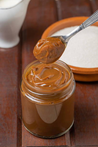 istock Spoon with Dulce de leche, traditional sweet from Argentina. 1448933021