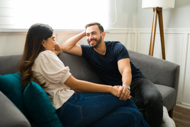 istock Man holding hands with his girlfriend on a casual date 1448933279